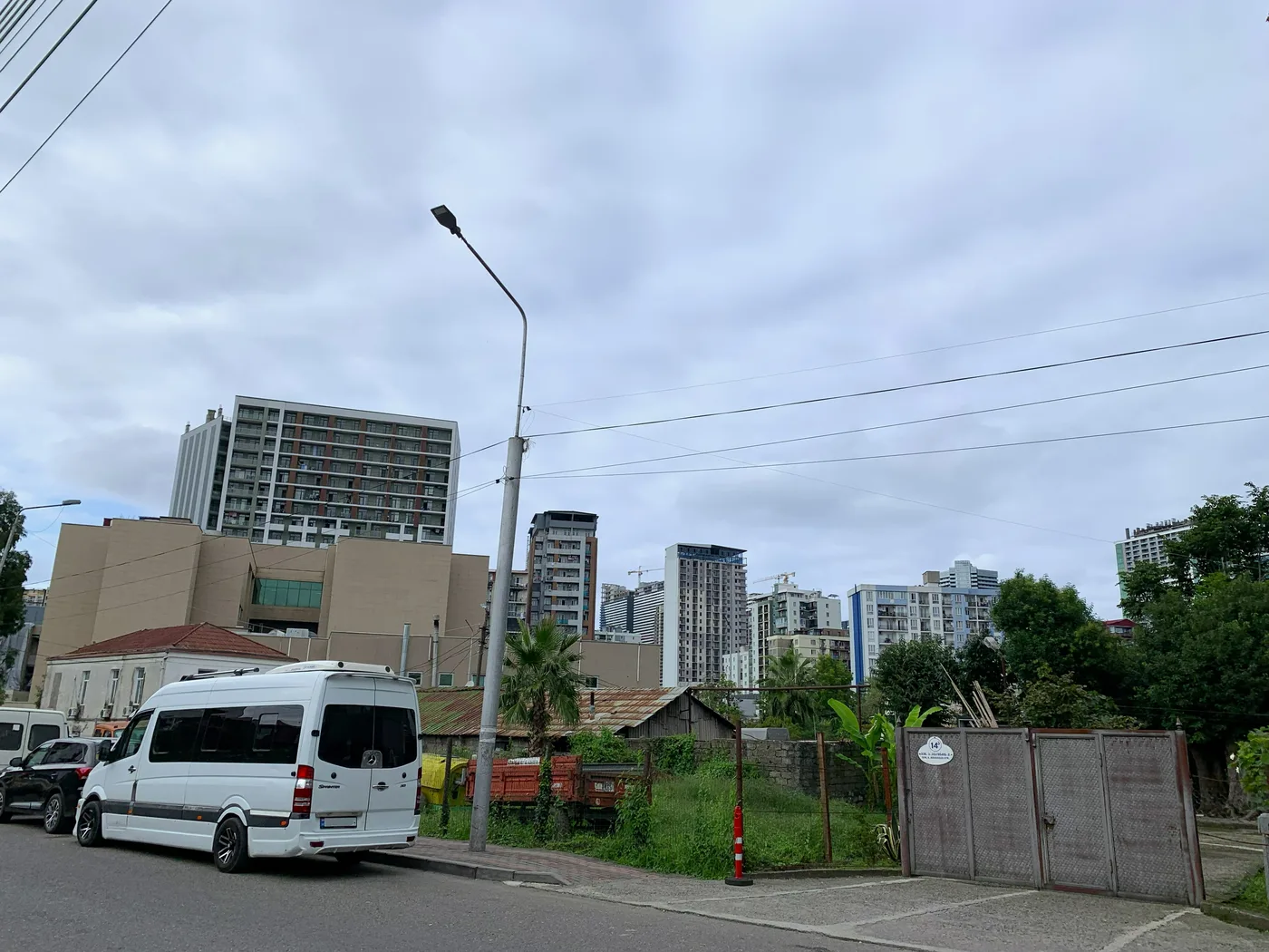 Private houses against a backdrop of high-rises in the Agmashenebeli district